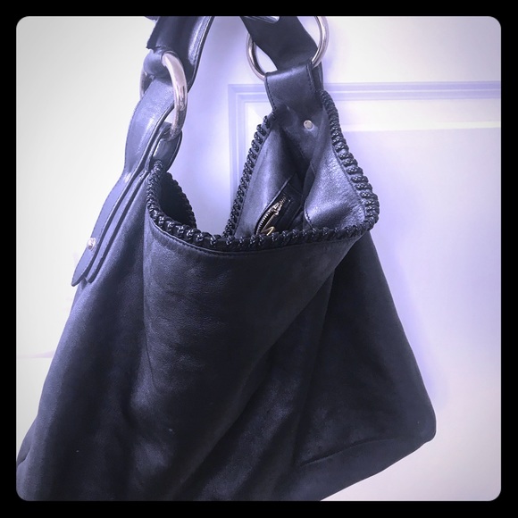 Barely used. Exterior leather is clean.Liner clean - Picture 1 of 7